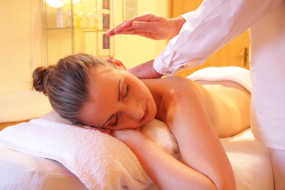 best oils for massage woman getting a massage