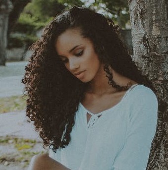 hair crimes black woman with curly hair