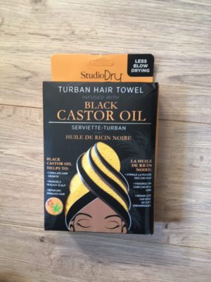 closeup of studiodry hair turban towel in box black castor oil infused