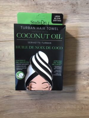closeup of studiodry hair turban towel in box coconut oil infused